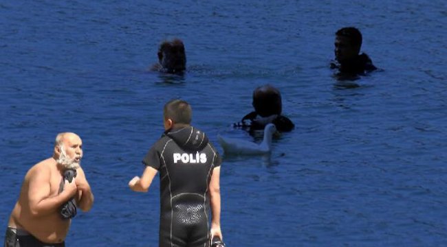 Baraj kapaklarının önünde yüzünce polisler harekete geçti! 'Yüzüyorum, neden karışıyorsunuz?'