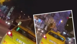 Kadıköy’de ilginç anlar! Taksi camından sarkarak dans etti